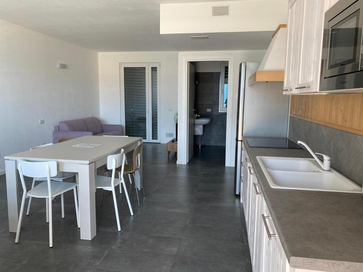 Modern Apartments Lake View With Pool Musso Bagian luar foto